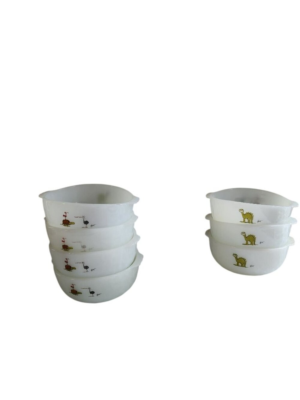 7 Fire King milk glass bowls featuring characters from the B.C. comic strip by J